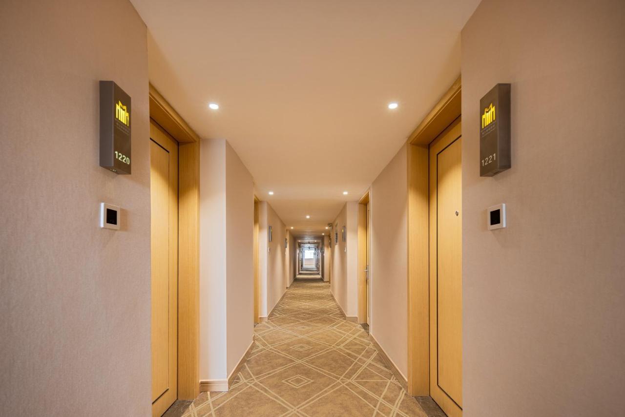 锦江都城酒店海南省政府日月广场免税店 Haikou  Bagian luar foto