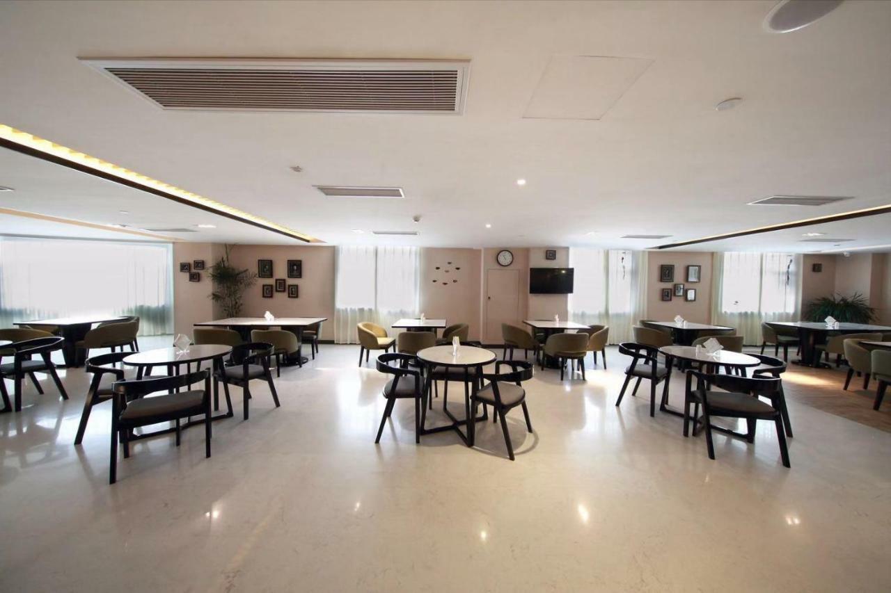 锦江都城酒店海南省政府日月广场免税店 Haikou  Bagian luar foto